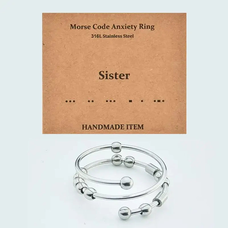 AuraCode spinner band on finger - rotating anxiety ring