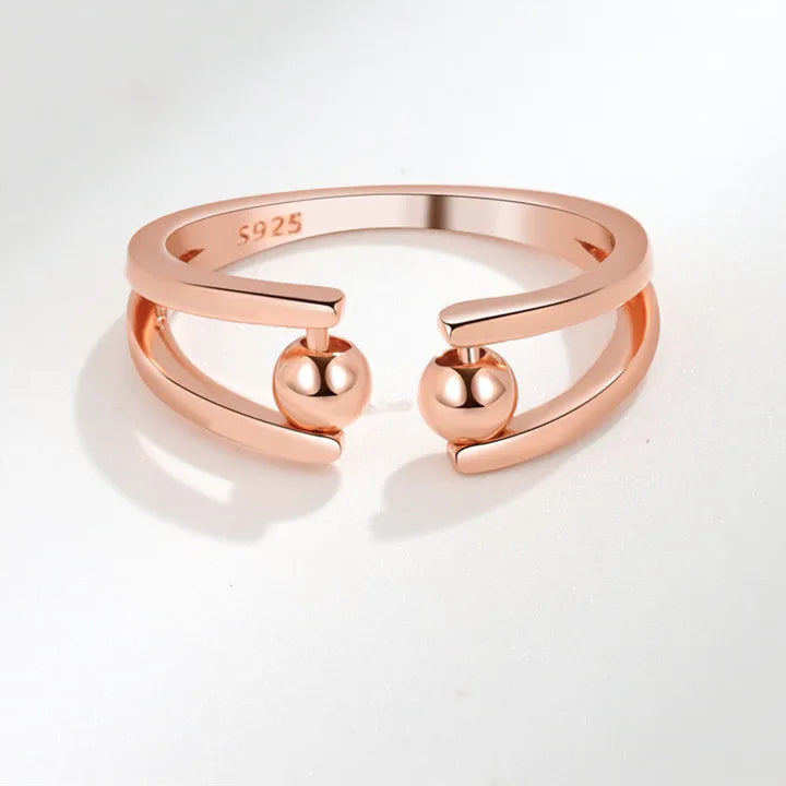 Arden fidget ring on hand - nature stress relief