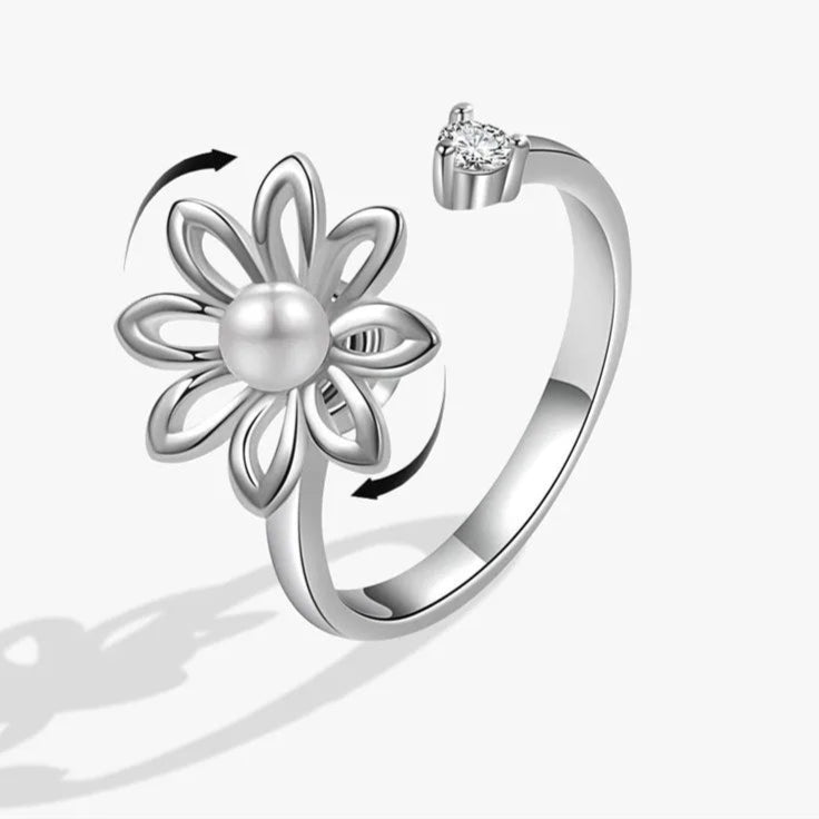 Azura stress ring on hand - sky-blue fidget band