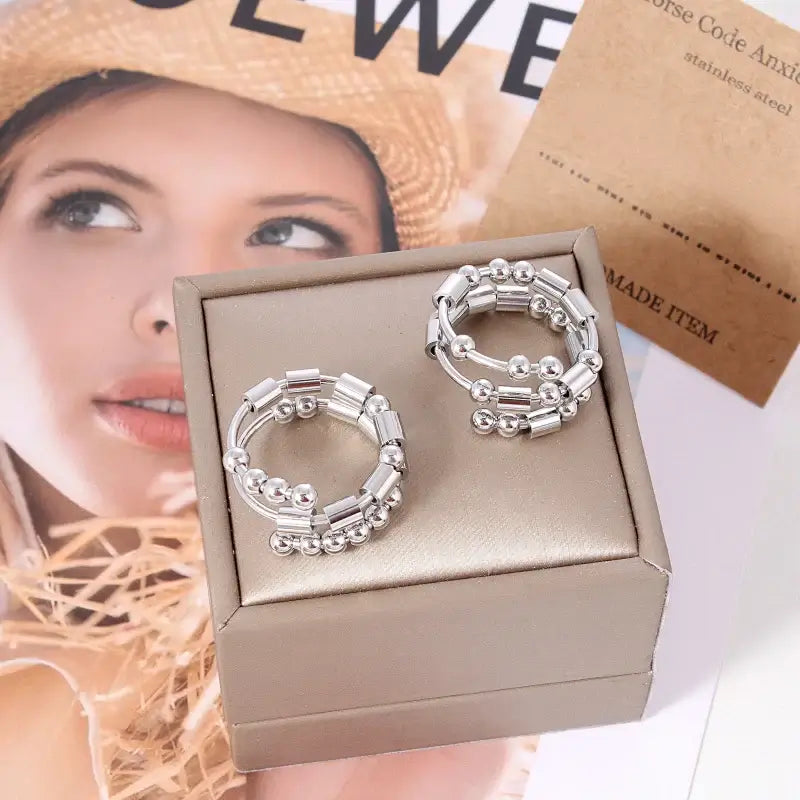 AuraCode anxiety ring packaging - premium calm jewelry gift