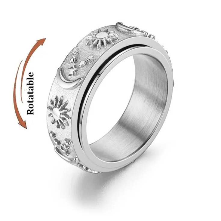 Astra anxiety ring on finger - cosmic calm band