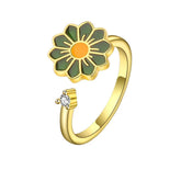 Aurian fidget ring on hand - golden stress relief