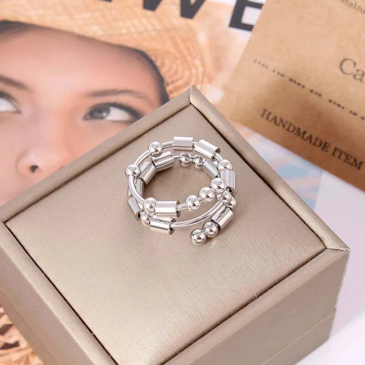 AuraCode spinner ring detail - premium anti-stress fidget band