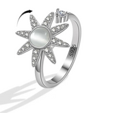 Aluna anxiety ring collection display - premium calm jewelry