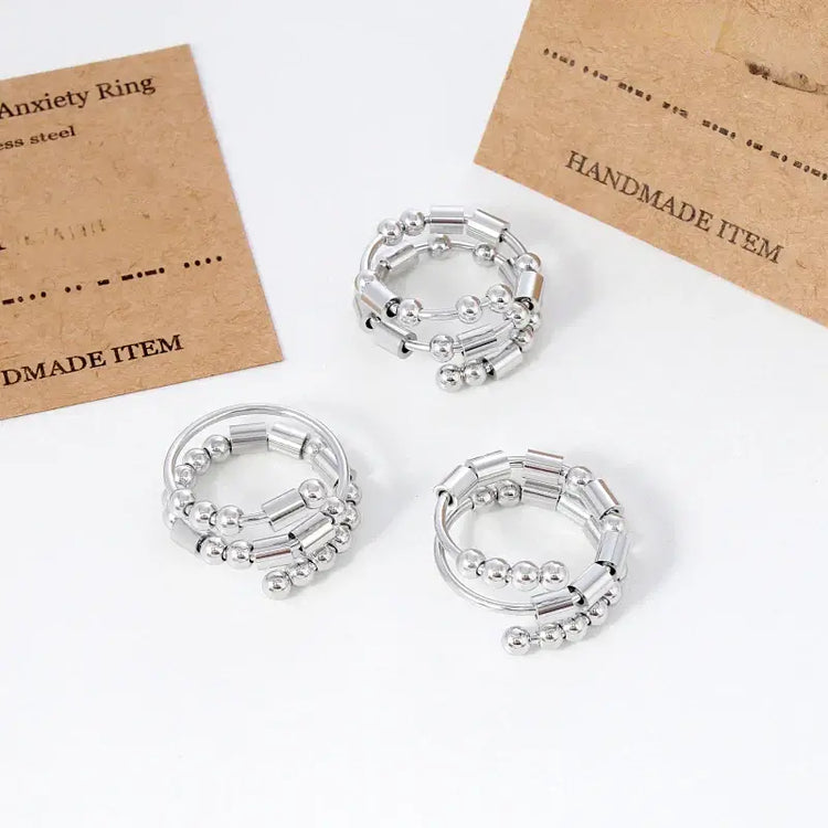 AuraCode spinner ring detail - premium anti-stress fidget band