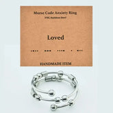 AuraCode anxiety ring on hand - elegant calm jewelry