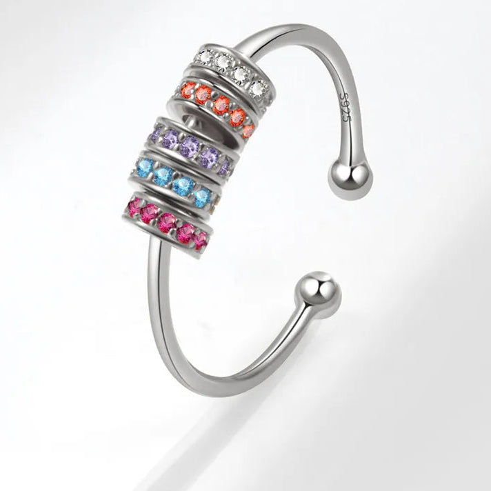 Aluna stress ring on hand - lunar fidget band