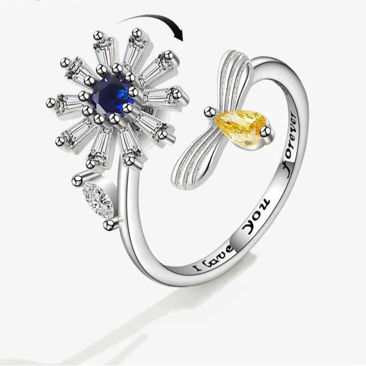 Auralis fidget ring on hand - radiant stress relief